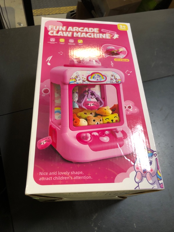 Photo 1 of TingingYuli Claw Machine for Kids,Unicorn Mini Vending Machines Candy Grabber Prize Dispenser Toys for Girls,Electronic Arcade Game with 20 Mini Plush Toys for Christmas Easter Birthday Gifts