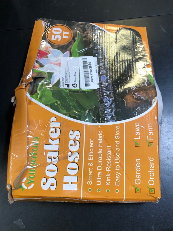 Photo 1 of Soaker Hose 50 FT - Yumatum Flat Garden Soaker Hose Irrigation Sprinkler, Save 80% Water, Heavy Duty Leakproof, 3/4" Linkable, Drip Watering Hose for Garden Beds, Lawns, Vegetable Field