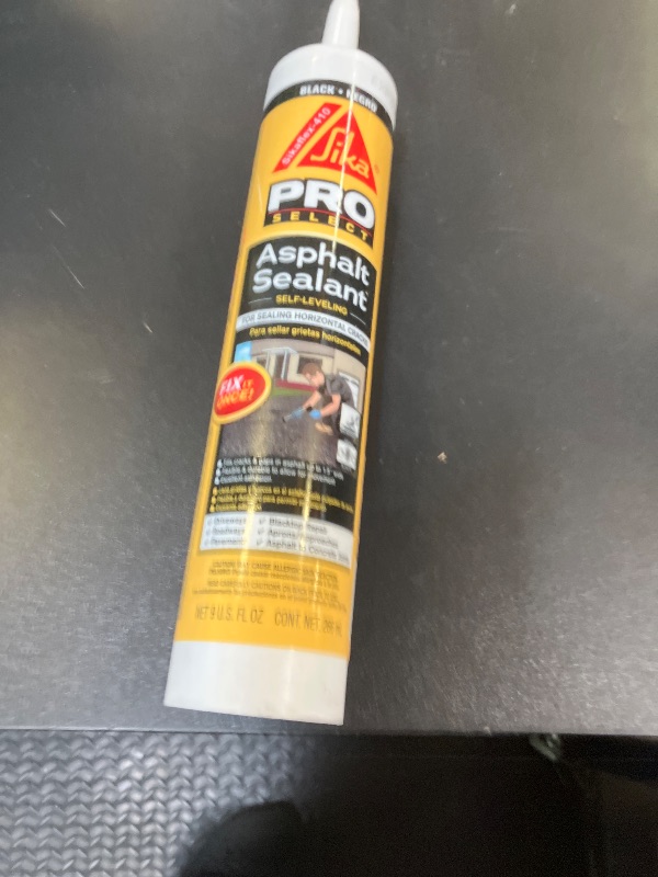 Photo 1 of SIKA Sikaflex-410 Asphalt Sealant, Black, Self-Leveling Hybrid Sealant for Filling Cracks in Asphalt Driveways, Roadways, and Pavements - 9 fl. oz. Cartridge, Fills Cracks up to 1.5 in. Wide
