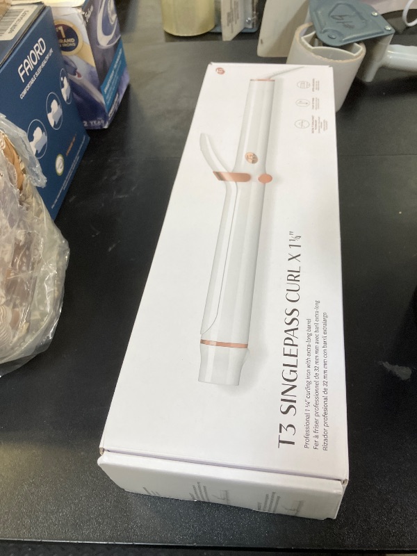 Photo 1 of T3 SinglePass Curl X Extra-Long Barrel Curling Iron with 9 Heat Settings and Ceramic Barrel for Fast Styling and Lasting Results on All Hair Types