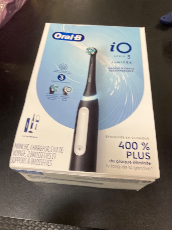 Photo 1 of Oral-B iO Deep Clean Rechargeable Electric Powered Toothbrush, Black with iO Series 3 Limited, 2 Brush Heads and Travel Case - Pressure Sensor to Protect Gums - 3 Cleaning Settings - 2 Minute Timer