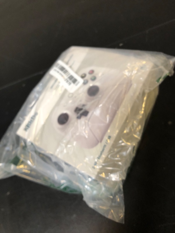 Photo 1 of 8BitDo Ultimate 2 Wireless Controller with TMR Joysticks for Windows & Android, Gaming Controller with Switchable Hall Effect/Tactile Triggers, RGB Fire Ring, 8Speed Wireless Tech, Charging Dock (White, Ultimate 2 Wireless)