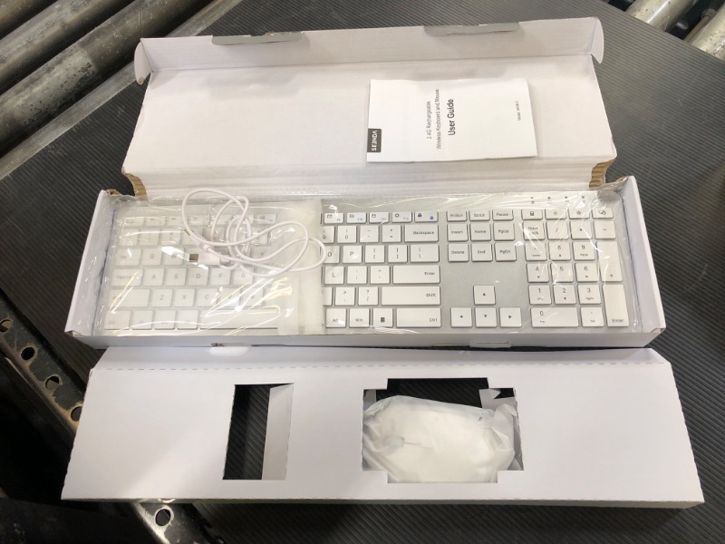 Photo 1 of Rechargeable Wireless Keyboard Mouse Combo - Seenda Full Size Cordless Keyboard & Mouse Sets with Build-in Lithium Battery Ultra Thin Quiet Keyboard Mice - Silver and White