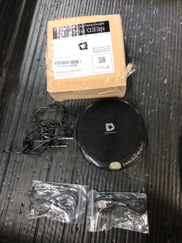 Photo 1 of Deluxe Products CD Player Portable with 60 Second Anti Skip, Stereo Earbuds, Includes Aux in Cable and AC USB Power Cable for use at Home or in Car