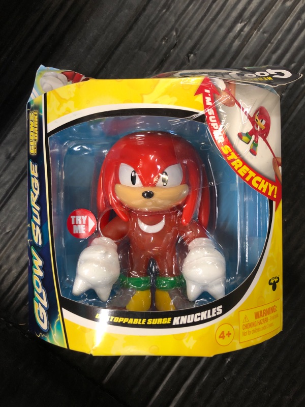 Photo 1 of Heroes of Goo Jit Zu Unstoppable Surge Knuckles, Powered Up with Glow Surge Giving Him Glow-in-The-Dark Powers, Scrunchy, Stretchy Filling, Stretch Him Up to 3 Times His Size
