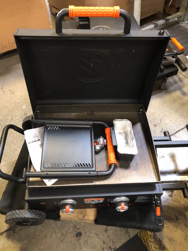 Photo 1 of Blackstone 22” On The Go Scissor-Leg Griddle with Two Burners -Stainless Steel Gas Griddle with Hood, Wheels, Side Shelf –Heavy Duty Outdoor Stainless Steel Griddle for Backyard, Patio Camping –1935