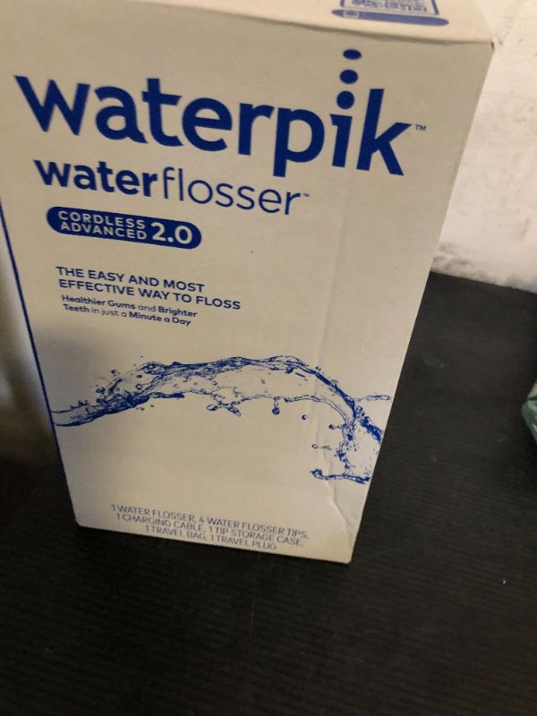 Photo 1 of Waterpik Cordless Advanced 2.0 Water Flosser For Teeth, Gums, Braces, Dental Care With Travel Bag and 4 Tips, ADA Accepted, Rechargeable, Portable, and Waterproof, Black WP-582, Packaging May Vary