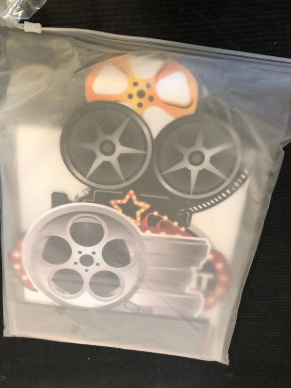 Photo 1 of Chinco 12 Pieces Movie Night Party Decorations Supplies Movie Theater Honeycomb Centerpiece 3D Microphone Ticket Star Video Paper Centerpiece Sign Table Decoration for Theater Birthday Party Favors
