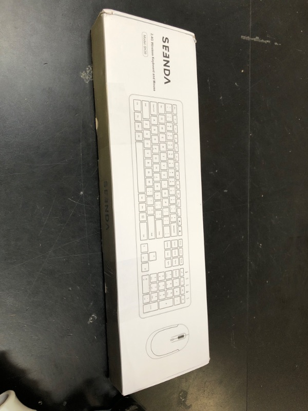 Photo 1 of Wireless Keyboard and Mouse Combo - Full Size Slim Thin Wireless Keyboard Mouse with Numeric Keypad 2.4G Stable Connection Adjustable DPI (White & Silver)