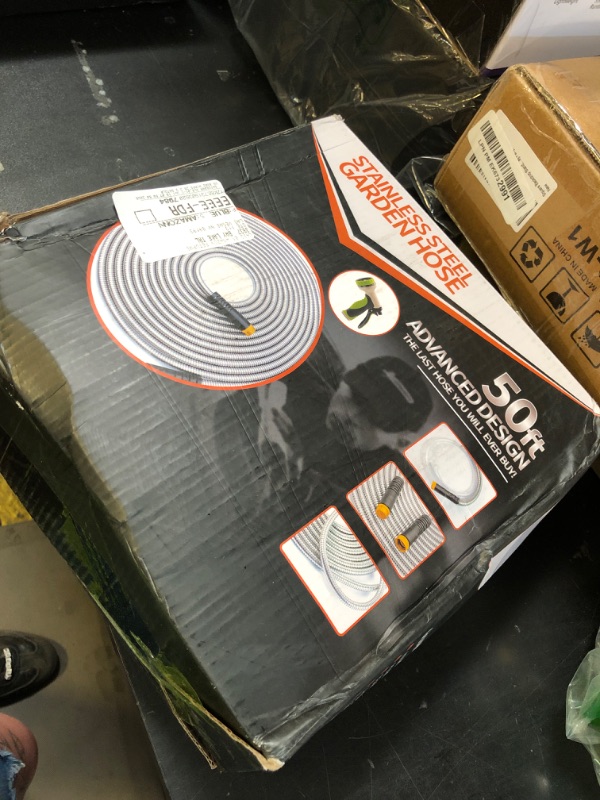 Photo 1 of Garden Hose 50 ft, Stainless Steel Water Hose with 10 Function Nozzle Flexible, Heavy Duty, Lightweight, No-Kink, Pet Proof, Puncture Proof Hose Metal for Yard, Outdoor