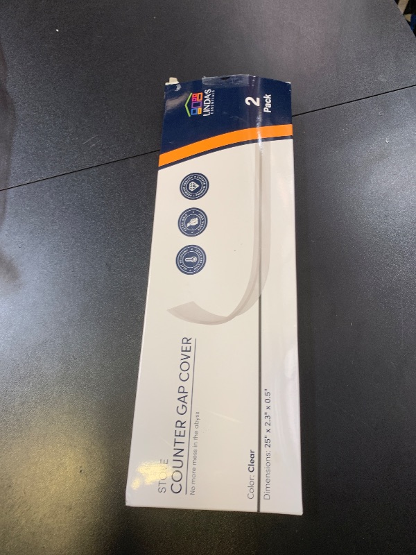 Photo 1 of Linda’s Essentials Silicone Stove Gap Covers (2 Pack), Heat Resistant Oven Gap Filler Seals Spaces Between Stovetop and Counter, Easy to Clean Stove Side Guard (25 Inches, Clear)