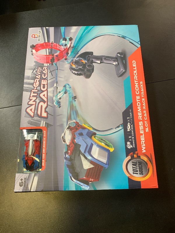 Photo 1 of Slot Car Race Track Sets Electric Remote Control Car Track Racing Game Rechargable Magnetic Cars Racing with Hand Controllers Circular Overpass Track Toys for Boys Kids Age 6 7 8-12