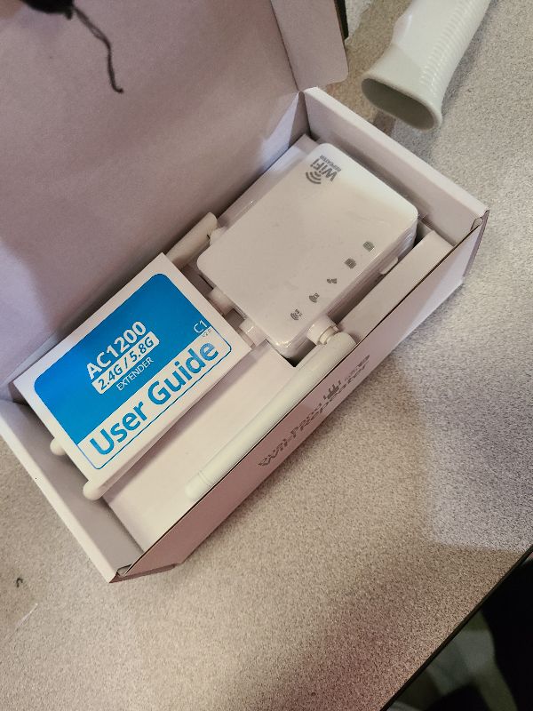 Photo 1 of 1200Mbps WiFi Extender Signal Booster – Dual Band WiFi Speed Enhancer, EasyMesh Compatible, 4 Directional Antennas (12880 Sq.ft),WiFi Booster Supports 105 Devices, Ethernet Port and Easy Setup