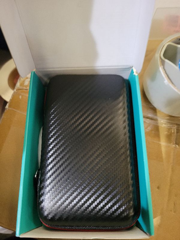 Photo 1 of ?R36MAX 4000mAh Portable Rechargeable Handheld Retro Game Console,Comfort Non-Slip Handheld Standing Retro Game Console with 64G TF Car,4.0-inch Screen,for Office,Black