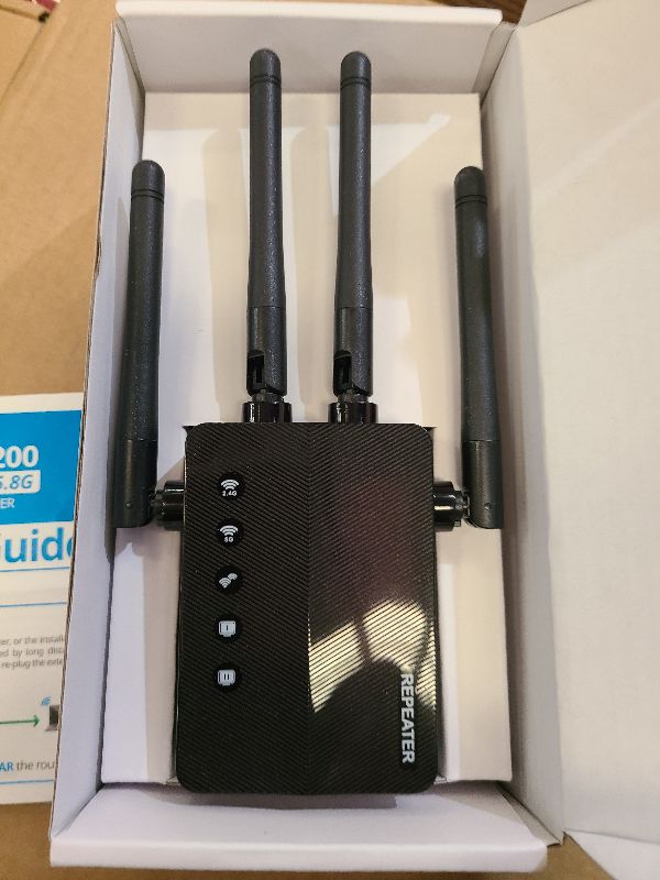 Photo 1 of 12880 Sq.Ft WiFi Extender Signal Booster, 1200Mbps WiFi Repeater, 105-Device Support, Simple Install, WiFi Extender with Wide Compatibility