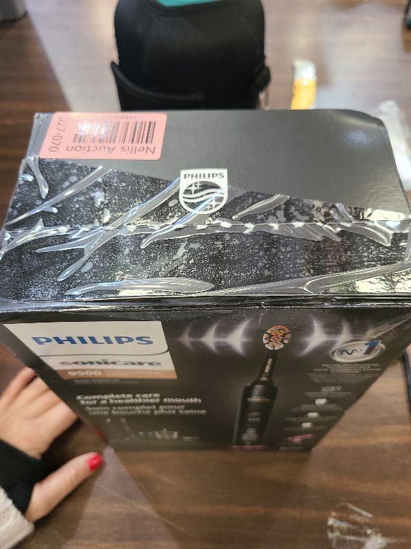 Photo 1 of Philips Sonicare DiamondClean Smart 9500 Electric Toothbrush, Sonic Toothbrush with App, Pressure Sensor, Brush Head Detection, 5 Brushing Modes and 3 Intensity Levels, Black, Model HX9923/11