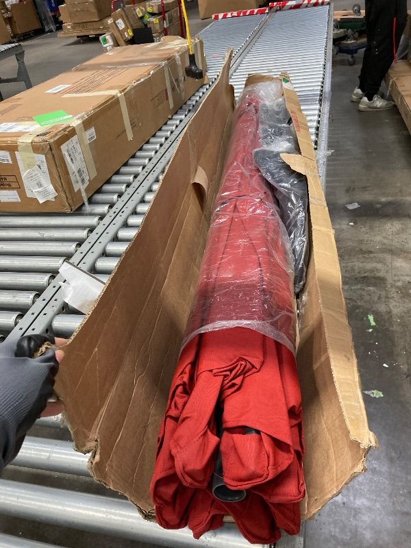 Photo 1 of **It is used, it is missing a part and it is not known if it works 100%.***Sundale Outdoor Olefin 5-Year-Non-Fading Solar 104 LED 11FT Solar Patio Umbrella with Sand Bag Base, Outdoor Umbrella with Tilt and Crank, Red