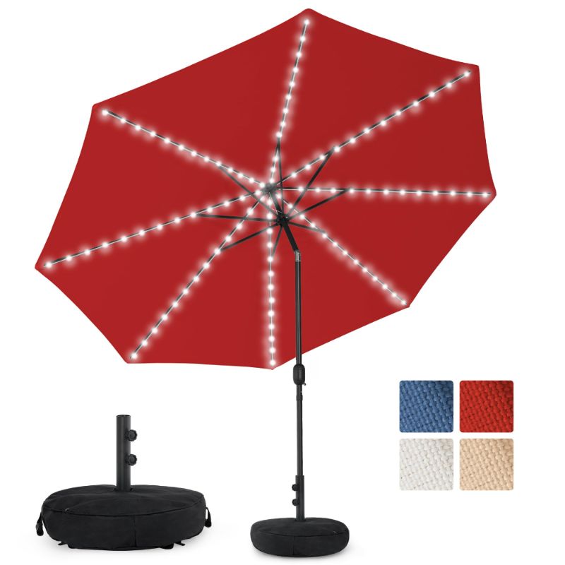 Photo 1 of **It is used, it is missing a part and it is not known if it works 100%.***Sundale Outdoor Olefin 5-Year-Non-Fading Solar 104 LED 11FT Solar Patio Umbrella with Sand Bag Base, Outdoor Umbrella with Tilt and Crank, Red