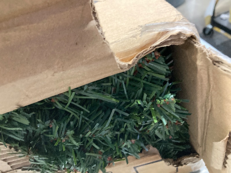 Photo 1 of Alupssuc 9ft Pre-Lit Artificial Christmas Tree, Hinged Slim Pencil Xmas Tree w/ Warm White Lights, Green