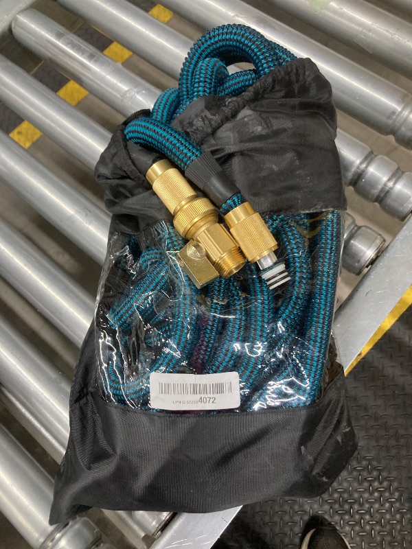 Photo 1 of ***(MISSING SPRAY NOZZLE -SELLING AS IS -PARTS ONLY)*** 
100 ft Expandable Garden Hose, 2025 New Ultra Lightweight & Flexible Water Hose, , Leak-Proof Solid Brass Fittings, High-Density Outer Fabric & Durable Inner Core, No Kink