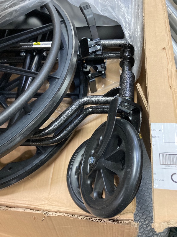 Photo 1 of ***USED***Drive Medical SSP118FA-SF Silver Sport 1 Folding Transport Wheelchair with Full Arms and Removable Swing-Away Footrest, Black
