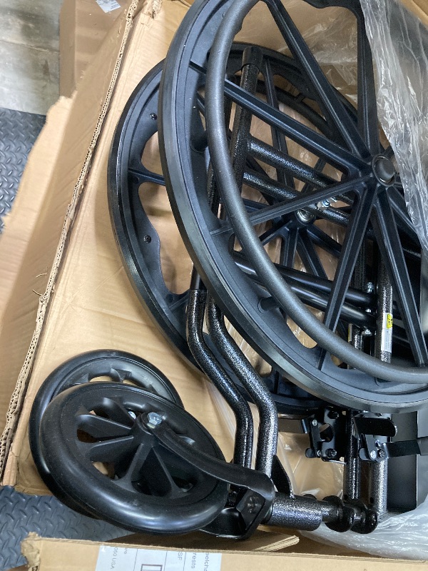 Photo 1 of ***USED***Drive Medical SSP118FA-SF Silver Sport 1 Folding Transport Wheelchair with Full Arms and Removable Swing-Away Footrest, Black