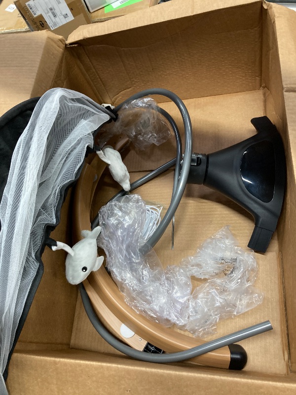 Photo 1 of  ***UKNKNOWN IF MISSING PARTS** 
Baby Swings 