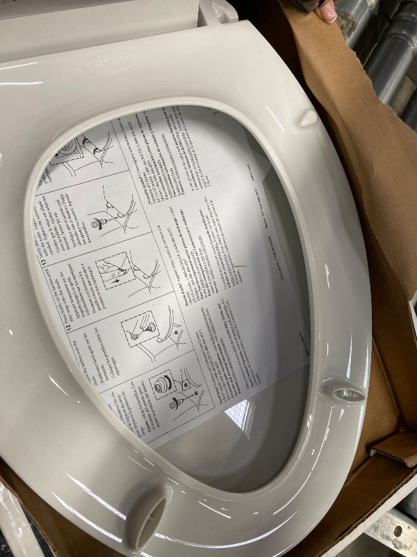 Photo 1 of ******(PARTS ONLY - SELLING AS IS -MISSING PARTS)*** 
KOHLER 4636-RL-0 Cachet ReadyLatch Elongated Toilet Seat Slow Close, Soft Close Toilet Seat Quiet Lid, Contoured Grip-Tight Bumpers Installation Hardware, Apartment Essentials, White  