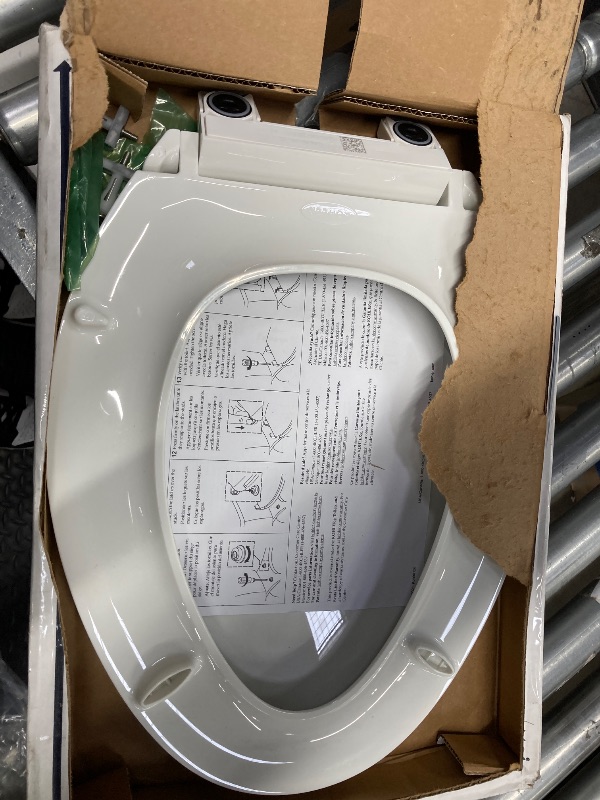 Photo 1 of ******(PARTS ONLY - SELLING AS IS -MISSING PARTS)*** 
KOHLER 4636-RL-0 Cachet ReadyLatch Elongated Toilet Seat Slow Close, Soft Close Toilet Seat Quiet Lid, Contoured Grip-Tight Bumpers Installation Hardware, Apartment Essentials, White  