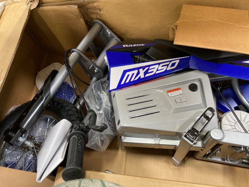 Photo 1 of ***I DON'T KNOW IF IT WORKS OR IS MISSING PARTS*** Razor MX350 Dirt Rocket Electric Motocross Bike, Blue, 10-12 inches
