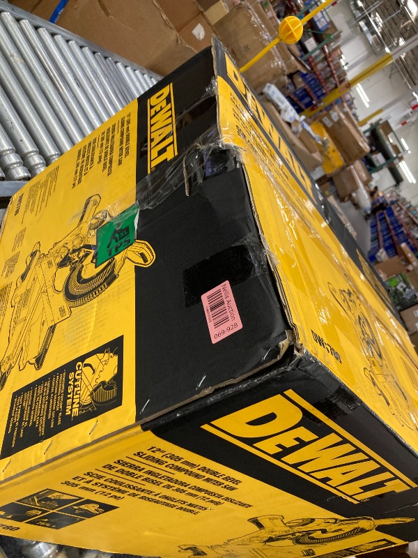 Photo 1 of ***I DON'T KNOW IF IT WORKS, I DON'T KNOW IF ANY PARTS ARE MISSING*** DEWALT Double Bevel Sliding Miter Saw, 12-inch, Compound (DWS780)