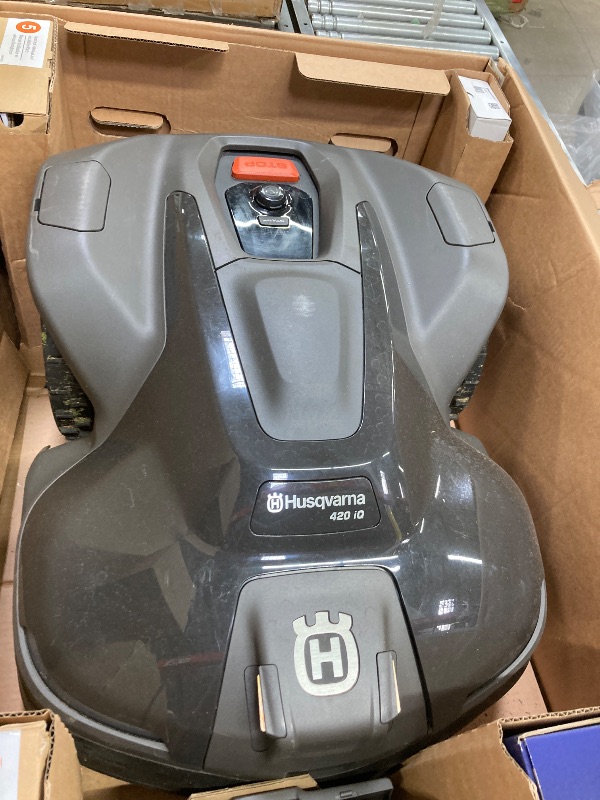 Photo 1 of ***I DON'T KNOW IF IT WORKS, I DON'T KNOW IF ANY PARTS ARE MISSING*** Husqvarna 420iQ Automower Robotic Mower, 1 Acre Mowing Capacity, Wire Free Robot Lawn Mower with Charging Station, RS1 EPOS Reference Station and Replacement Blades