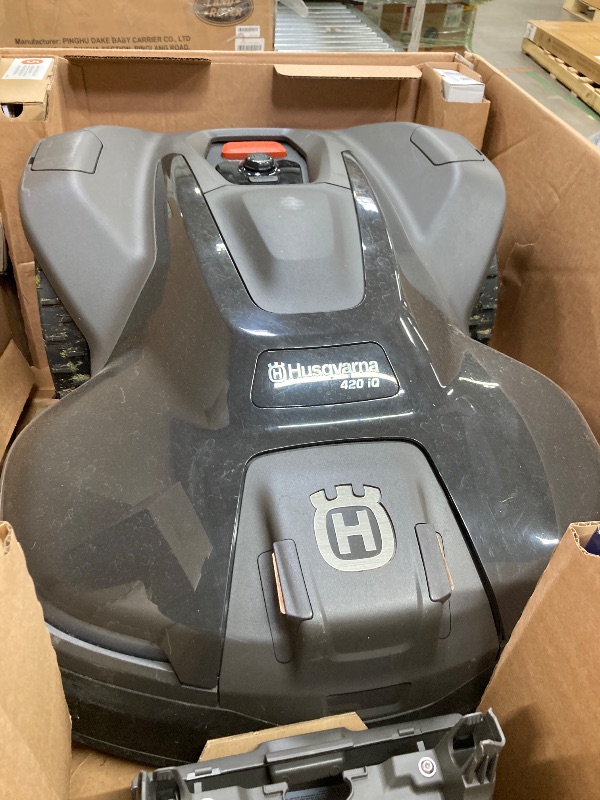 Photo 1 of ***I DON'T KNOW IF IT WORKS, I DON'T KNOW IF ANY PARTS ARE MISSING*** Husqvarna 420iQ Automower Robotic Mower, 1 Acre Mowing Capacity, Wire Free Robot Lawn Mower with Charging Station, RS1 EPOS Reference Station and Replacement Blades