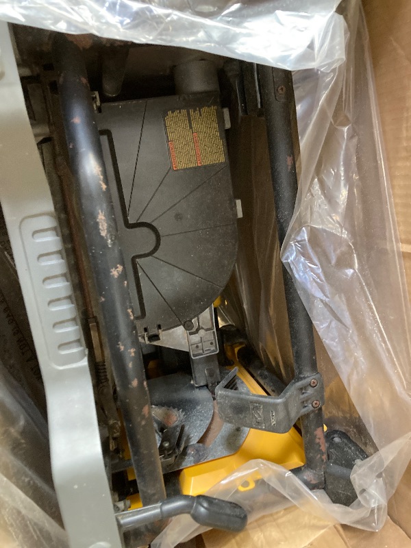 Photo 1 of ***I DON'T KNOW IF IT WORKS, I DON'T KNOW IF ANY PARTS ARE MISSING** DEWALT 10-Inch Table Saw with Rolling Stand, 32-1/2-Inch Rip Capacity (DWE7491RS)