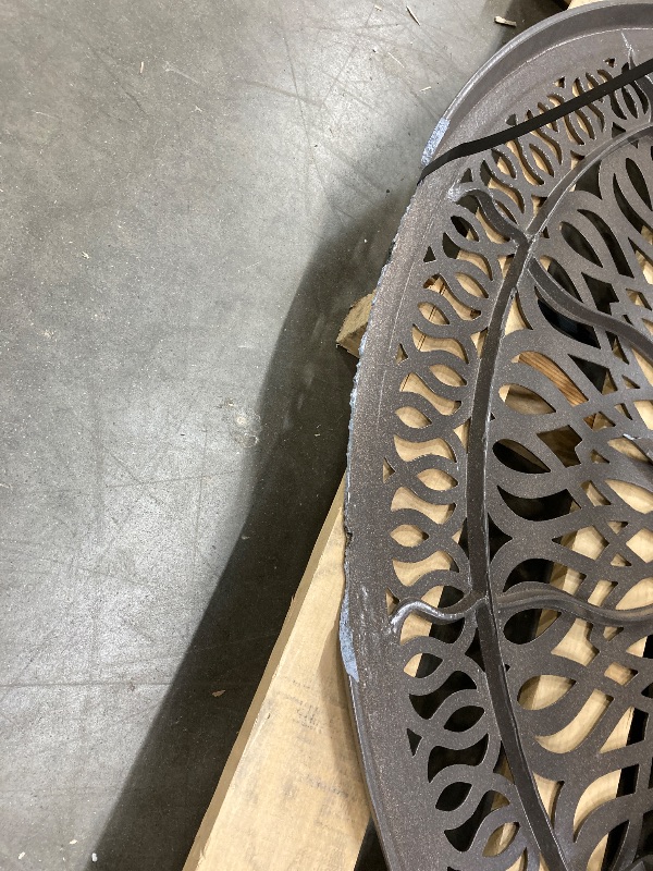 Photo 1 of **It is used and has some broken pieces on the sides of the table and is missing parts.**Homestyles 7 Piece Outdoor Dining Set, Taupe