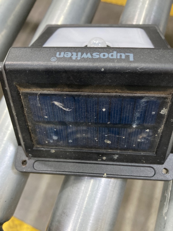Photo 1 of ***(1 PACK ONLY -MISSING PARTS- SELLING AS IS) *** 
NIORSUN Solar Fence Lights,1 Pack Solars Deck Light,Warm White Color,Outdoor Bulb Waterproof Led IP65,Power Patio Lamp with Lenses for Outside/Backyard/Railing/Yard(Black)   ***(SOME DUST/DIRT RESIDUE, S