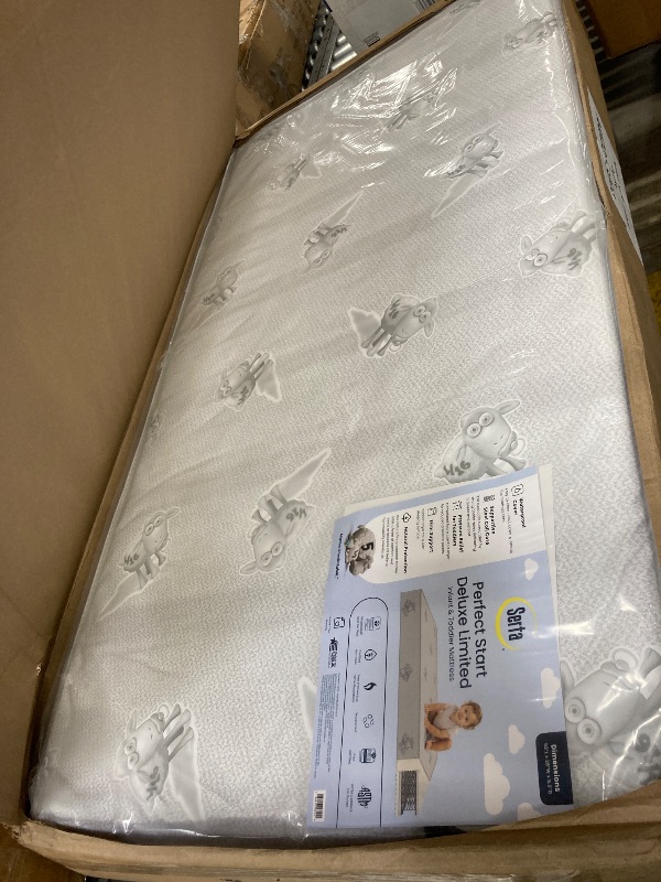 Photo 1 of **HAS SEVERAL CUTS IN PLASTIC-SEE PICS**Serta Perfect Start Deluxe Limited Dual Sided Baby Crib Mattress and Toddler Mattress, GREENGUARD Gold Certified, Firm Support, Waterproof, 7 Year Warranty, Made in USA