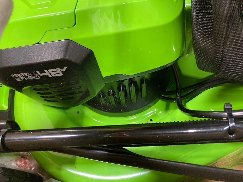 Photo 1 of ***(SELLING AS IS -MISSING PIECES )*** Greenworks 48V (2x24V) 21" Brushless Mower+12" String Trimmer+320CFM Blower,(2) 5.0Ah Batteries and 4A Dual Port Charger  ***(SOME SCUFFS/SCRATCHES, DIRT/GRASS RESIDUE, MISSING PIECES BOX RIPPED/TORN)***