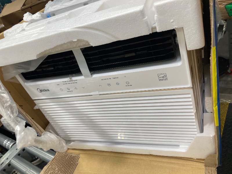 Photo 1 of *****It doesn't work, it doesn't turn on, it's just for parts.*******Midea 12,000 BTU Smart Inverter Window Air Conditioner with APP, Alexa Control, 115V AC Unit Cools up to 550 Sq. Ft, Quiet Operation, Energy Saving, Remote & Easy Installation Kit, White