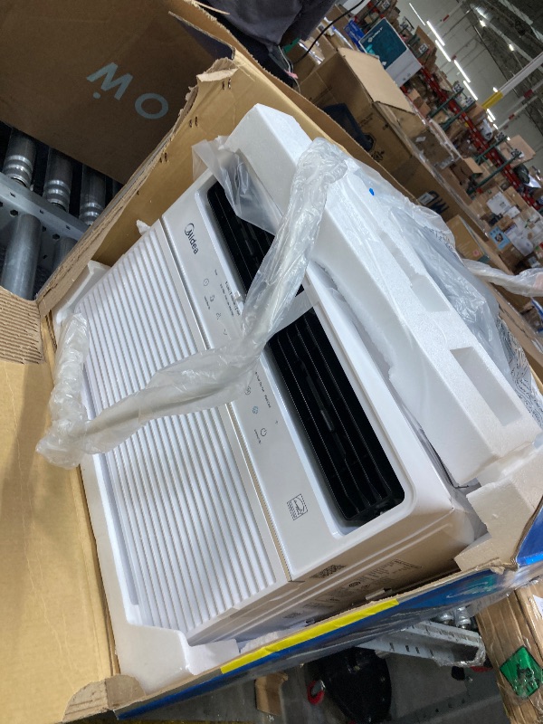 Photo 1 of *****It doesn't work, it doesn't turn on, it's just for parts.*******Midea 12,000 BTU Smart Inverter Window Air Conditioner with APP, Alexa Control, 115V AC Unit Cools up to 550 Sq. Ft, Quiet Operation, Energy Saving, Remote & Easy Installation Kit, White