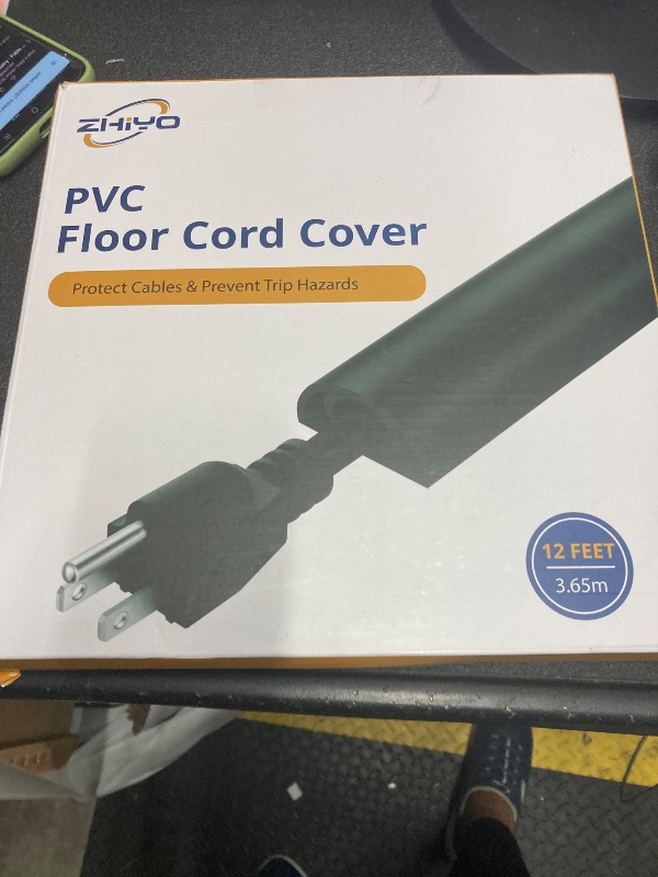 Photo 1 of 12ft Cord Cover Floor for Extension Cords, Self-Adhesive Floor Cable Cover to Protect Cables & Prevent Tripping, PVC Cord Hider Protector, Internal Wire Management Channel Diameter: 0.39", Brown