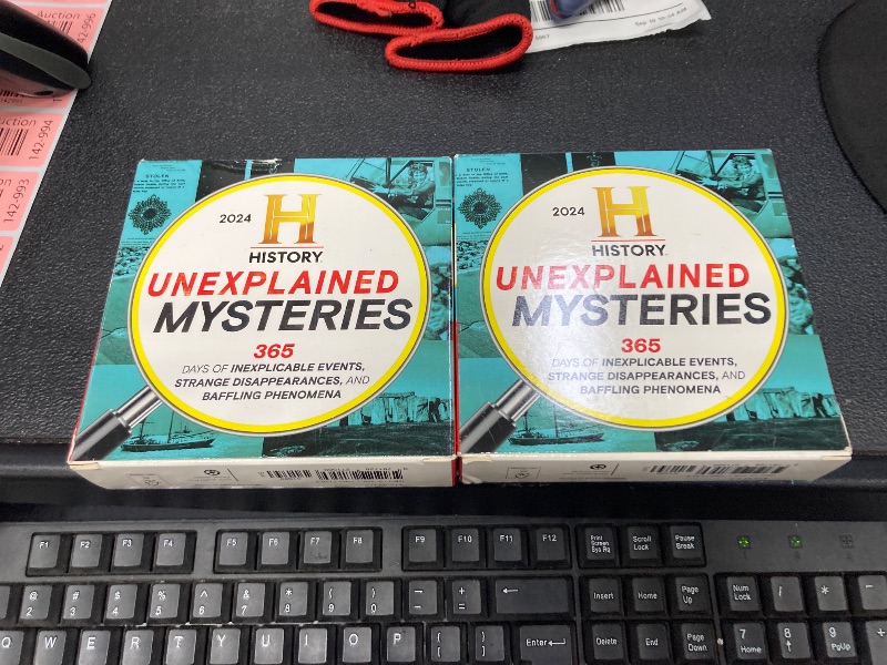 Photo 1 of 2 PACK 2024 History Channel Unexplained Mysteries Boxed Calendar: Inexplicable Events, Strange Disappearances, Baffling Phenomena (Daily Desk Gift for True Crime Fans) (Moments in HISTORY™ Calendars)