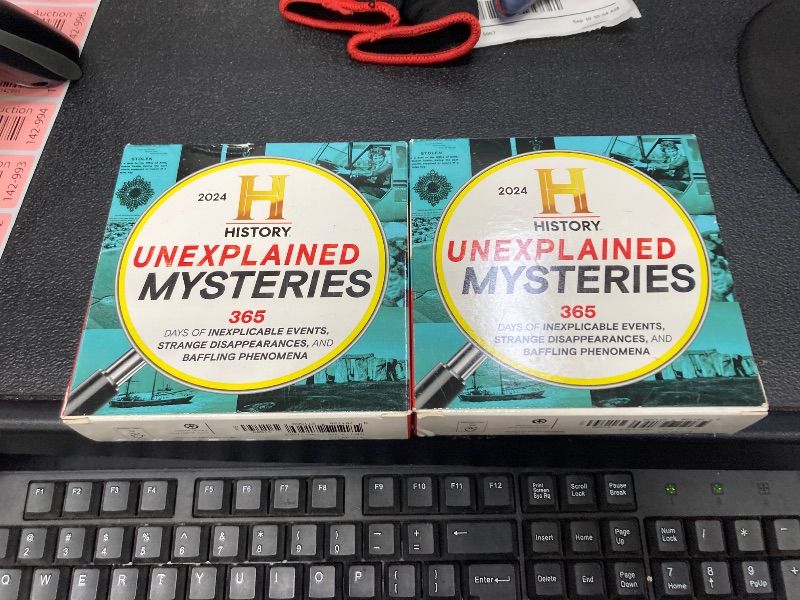 Photo 1 of 2 PACK 2024 History Channel Unexplained Mysteries Boxed Calendar: Inexplicable Events, Strange Disappearances, Baffling Phenomena (Daily Desk Gift for True Crime Fans) (Moments in HISTORY™ Calendars)