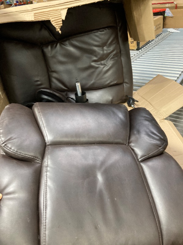 Photo 1 of *****It has a small tear on the bottom, it is used, it is missing parts***** broAmazon Basics Classic Puresoft PU Padded Mid-Back Height Adjustable Office Computer Desk Chair with Armrest, 25.75"D x 24.25"W x 42.25"H, Brown