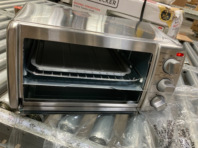 Photo 1 of *****It is used and has some small dents around it.**BLACK+DECKER 4-Slice Toaster Oven, TO1745SSG-1A, Even Toast, 4 Cooking Functions Bake, Broil, Toast and Keep Warm, Removable Crumb Tray, Timer