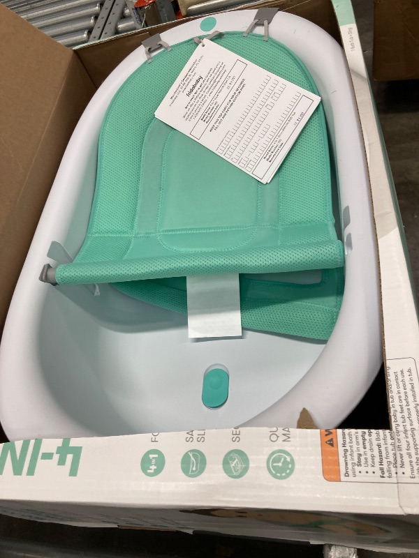 Photo 1 of *** USED ****Frida Baby 4-in-1 Grow-with-Me Baby Bathtub