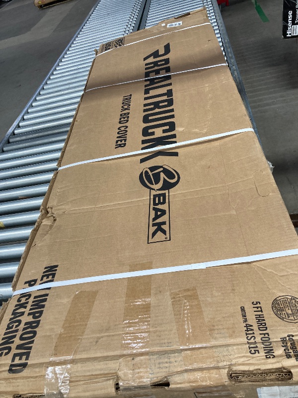 Photo 1 of **Factory Sealed. **

Real Truck BAK Backflip MX4 Hard Folding Truck Bed Tonneau Cover | 448135 | Fits 2019-2025 Chevy/GMC Silverado/Sierra (Works with Carbon Pro Bed) Works w/MultiPro/Flex Tailgate 5' 10" Bed (69.9")