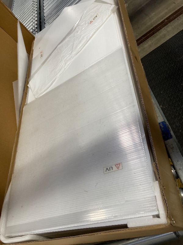 Photo 1 of **Stock photo for reference, actual item may differ. **

8 Pack Polycarbonate Greenhouse Panels, 6' x 2' x 0.24'' Twin-Wall Polycarbonate Sheets, All Weather Clear Roof Panels Greenhouse Replacement Panels