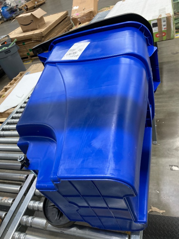 Photo 1 of **** missing one wheel******Rubbermaid Commercial Products BRUTE Rollout Heavy-Duty Wheeled Recycling Can/Bin, 50-Gallon, Blue Recycling, for Restaurants/Hospitals/Offices/Warehouses/Garage