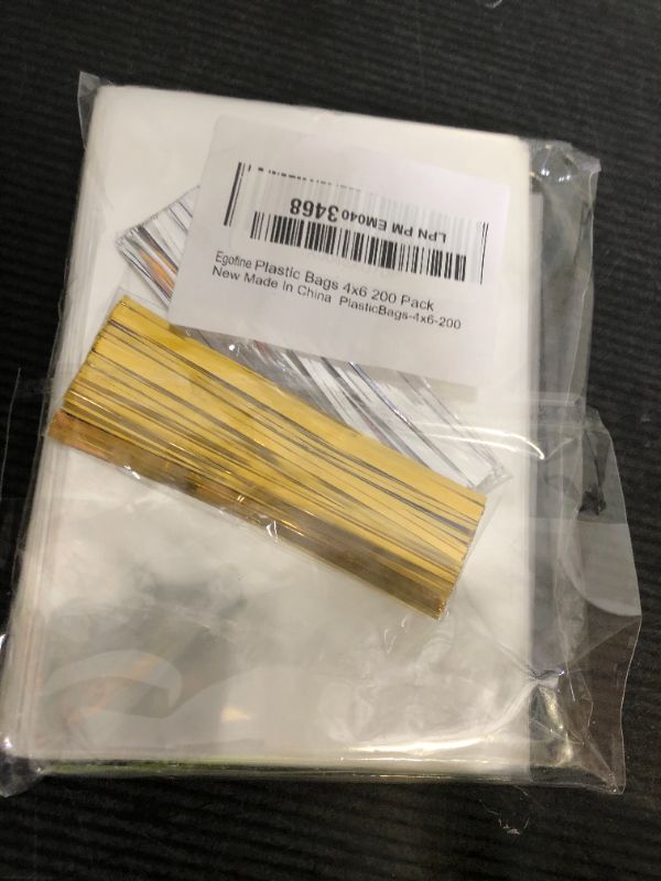 Photo 1 of Egofine Clear Small Treat Bags, 200 Pcs 4x6 Inches Cellophane Bags with 200 Twist Ties for Gift Wrapping, Packaging Candy, Candies, Goodie, Party Favors